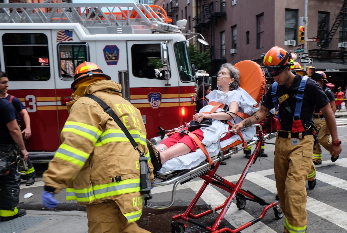 Bleecker basement blaze billows smoke in tony Atrium building 1