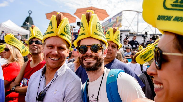 Nathan's Hot Dog Eating Contest 2017: Photos from the Coney Island event 16 Spectators wearing hotdog hats cheer on the competitores at the Nathan's Annual Hot Dog Eating Competition in Coney Island, Tuesday, July 4, 2017.