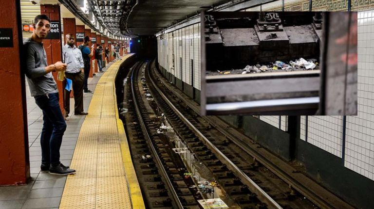 The MTA is considering food restrictions on subways as part of its effort to fight track fires. Above, trash is seen on the tracks at the Fulton Street station.