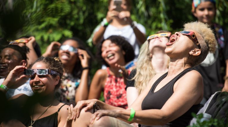 Solar eclipse gets New Yorkers looking to sky for rare celestial event 2 The partial solar eclipse over New York City had everyone looking skyward on Monday, Aug. 21, 2017. Above, New Yorkers watch the eclipse at Pioneer Works on Pioneer Street in Brooklyn.