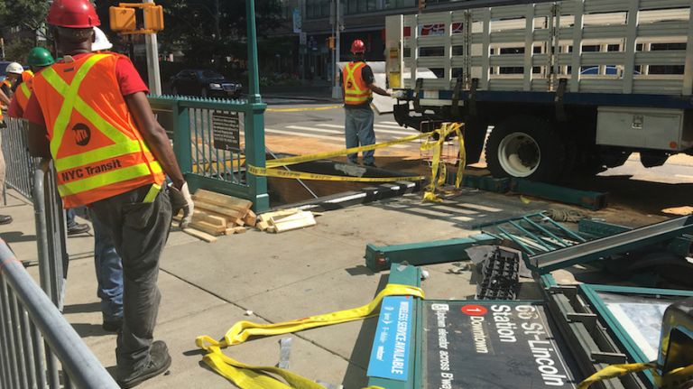 The West 66th Street 1 train station entrance was destroyed Wednesday morning when a tractor trailer collided with an SUV, police said. The crash left two people injured, they added.