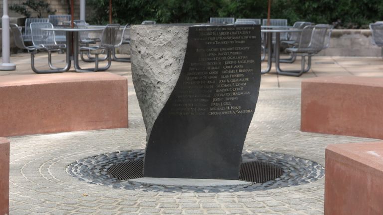 Firefighters Memorial Park at Ritz Plaza on West 48th Street honors the members of Engine 54, Ladder 4, Battalion 9 who died on Sept. 11, 2001.