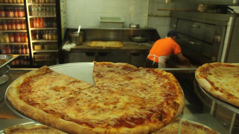 The New York-style pizza, complete with a thin crust, cheese and dollops of tomato sauce, remains a point of pride for New Yorkers.
