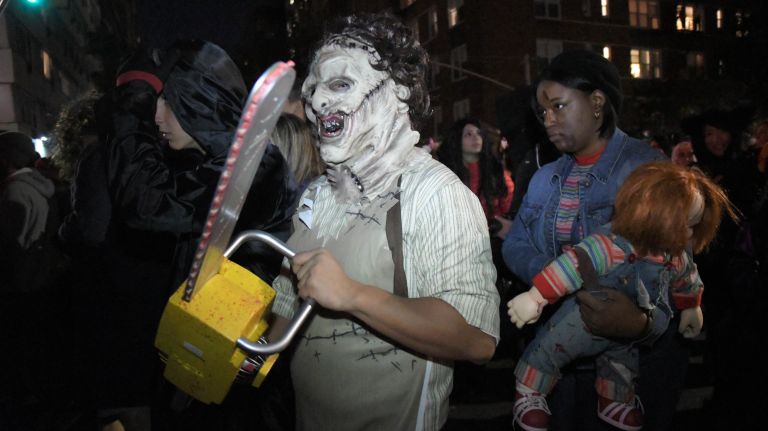 Village Halloween Parade photos highlight city's spookier side 38 Parade marchers travel up Sixth Avenue in the 44th Annual Village Halloween Parade in Manhattan, Tuesday, Oct. 31, 2017.