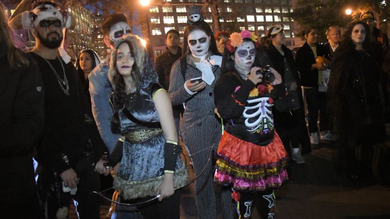 Village Halloween Parade photos highlight city's spookier side 46 Revelers gather in lower Manhattan before the start of the 44th annual Village Halloween Parade on Tuesday, Oct. 31, 2017.