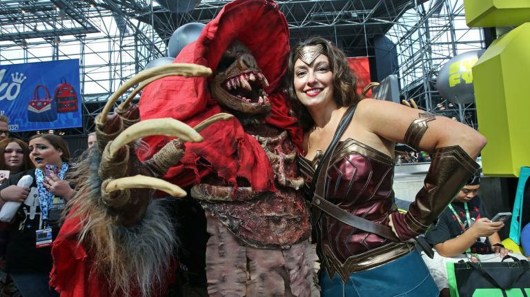 New York Comic Con attracted  more than 200,000 fans of all things pop culture -- including cosplayers Brian Foglia and Lorena Vega  -- to the Javits Center and other venues.
