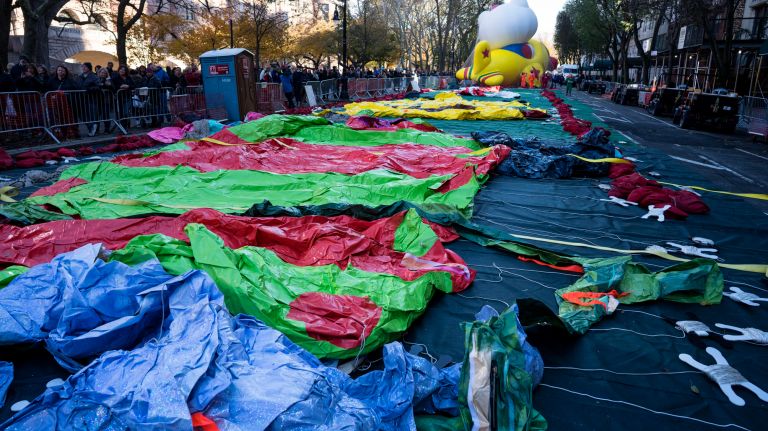 Balloons are prepared for inflation along 79th Street in Manhattan on Wednesday, Nov. 22, 2017, the day before the Macy's Thanksgiving Day Parade. Approximately 300,000 cubic square feet of helium is used to inflate the balloons.
