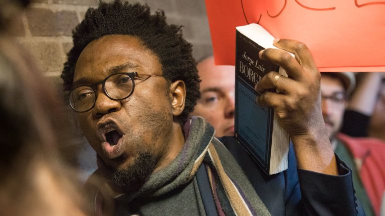 Stony Brook University professor Patrice Nganang, shown May 10, 2017, at a demonstration against budget cuts on campus, was arrested in Cameroon after he wrote a Facebook post that included a threat to the country's president. 