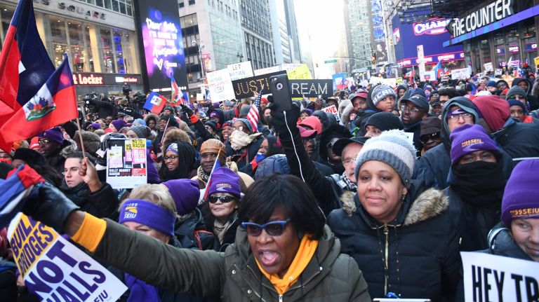 The Rally Against Racism in Times Square on Jan. 15, 2018, drew hundreds of protesters following President Donald Trump's recent comments disparaging immigrants from Haiti and African nations.