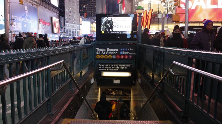 Times Square subway stabbing injures 1, suspect still at large, police say 2 The Times Square subway station was the scene of a stabbing on Sunday, the NYPD says.