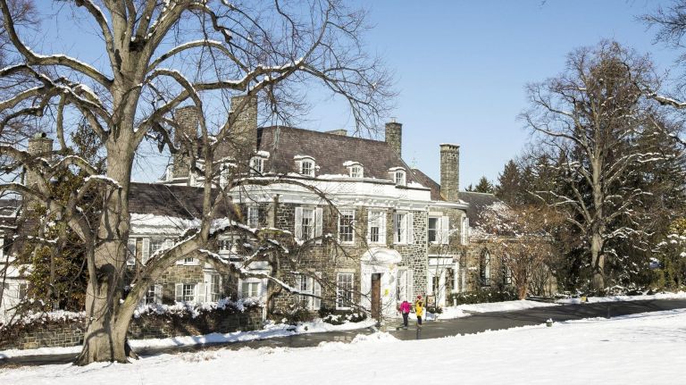 Snow fall on the Wave Hill grounds over looking The Wave Hill House in the Bronx on Feb. 18, 2018.