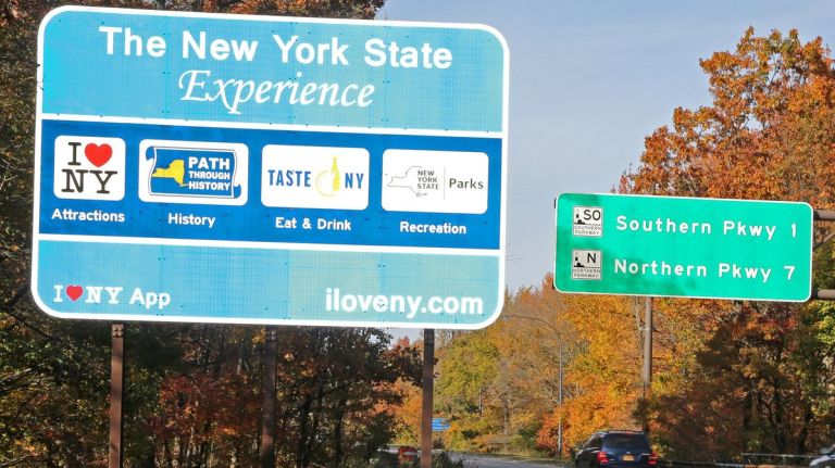 Useless ‘I Love NY’ signs will finally hit the road 2 One of the controversial blue New York State tourism signs on the Meadowbrook Parkway in Freeport, Nov. 5, 2016.