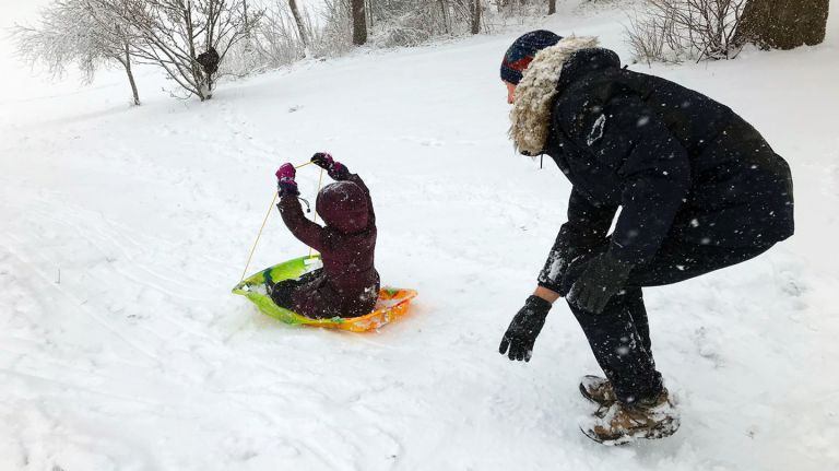On a snow day, fun refuses to be canceled 2 As a springtime snow storm blew through New York on Wednesday, Prospect Park was full of children sledding and enjoying their snow day.