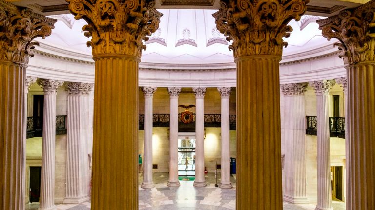 Federal Hall's columns are fractured, moldy and discolored, on Tuesday, March 6, 2018.