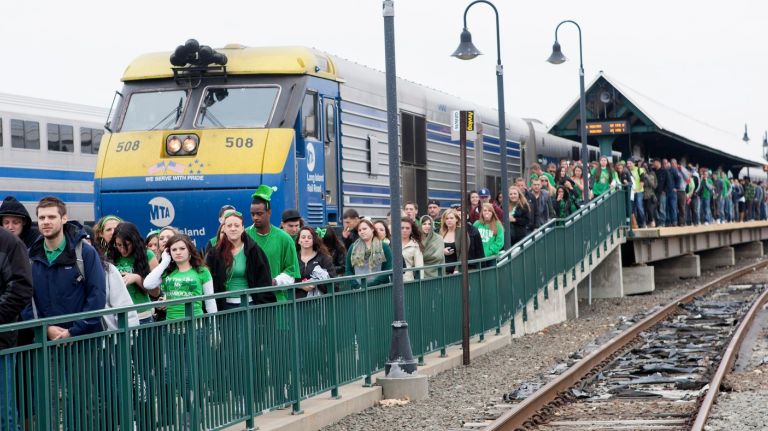 People depart from the Long Island Railroad's Montauk station to watch the  St. Patrick's Day Parade in Montauk.