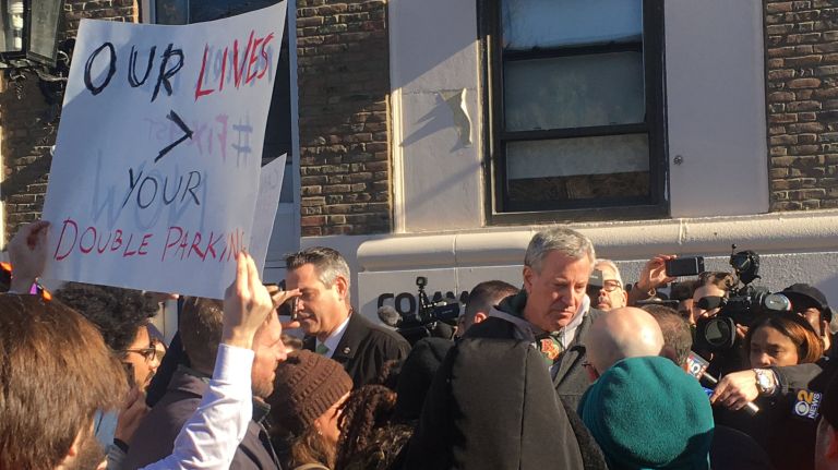 Mayor Bill de Blasio arrives at the Park Slope YMCA in Brooklyn on March 6, 2018, with transit advocates calling for safer streets following a   crash nearby that killed two children. 