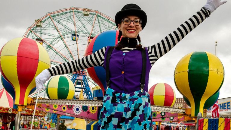 Coney Island's Luna Park opening celebrated 10 A stilt walker is on hand at the opening ceremony for the Wonder Wheel in Luna Park on Sunday.
