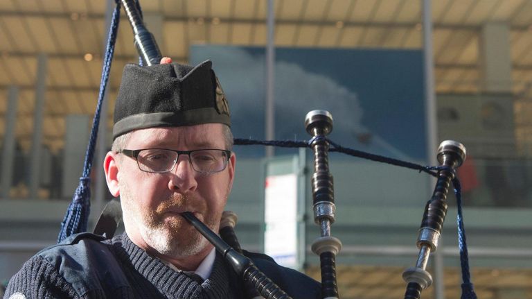 Michael Twomey, 50, an instructor of Brooklyn's Xaverian High School pipe and drum band, practiced before the start of the parade.