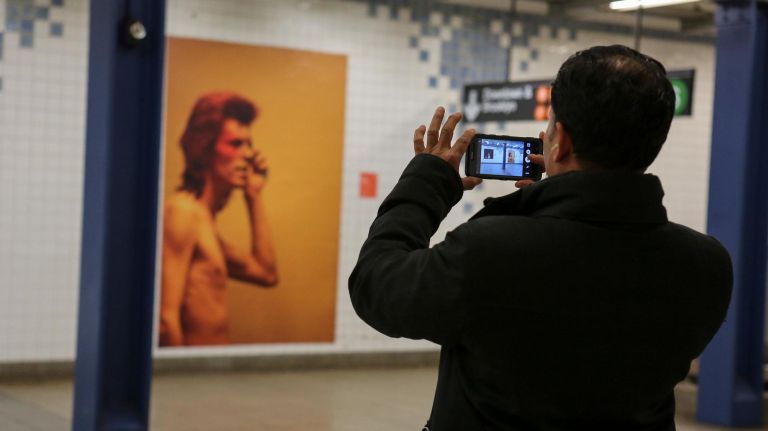 The Bowie exhibit, which features the icon's life in photos and quotes throughout the Broadway-Lafayette Street subway station, is drawing fans.
