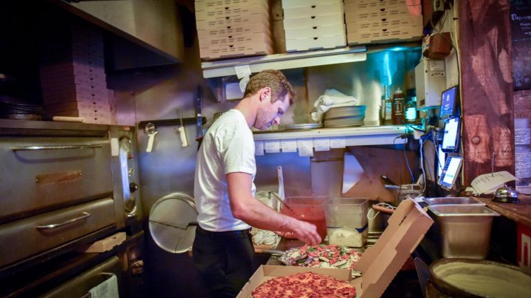 A look inside Emmett's, offering Chicago-style pizza in NY 14 Emmett Burke also features thin-crust pies at the pizzeria.
