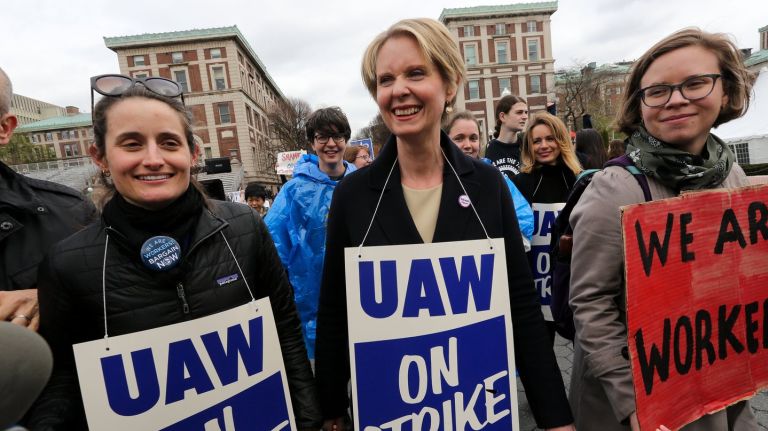 Cynthia Nixon marches with striking graduate students at Columbia University on Monday, April 30, 2018.