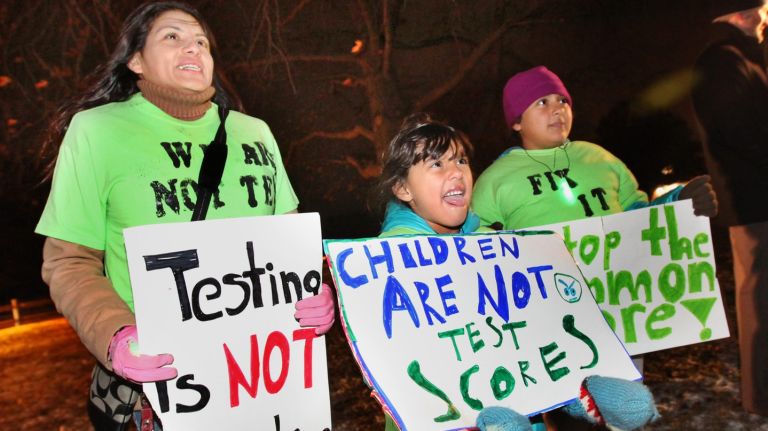 Opponents of using school test scores to evaluate teachers demonstrate back in 2013 in East Setauket, Long Island.