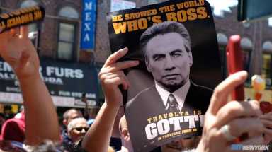 New York State Sen. Marty Golden honors the actor John Travolta in Brooklyn