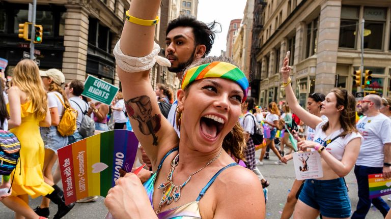 Pride parade NYC: Photos of the 2018 march through Manhattan 33 Marchers of all colors parade down the street.