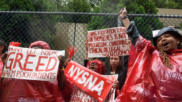 Doctors, nurses and staff members rally outside NewYork-Presbyterian Allen Hospital to proteste the planned shuttering of the hospital's psychiatric ward on Wednesday, June 13, 2018.