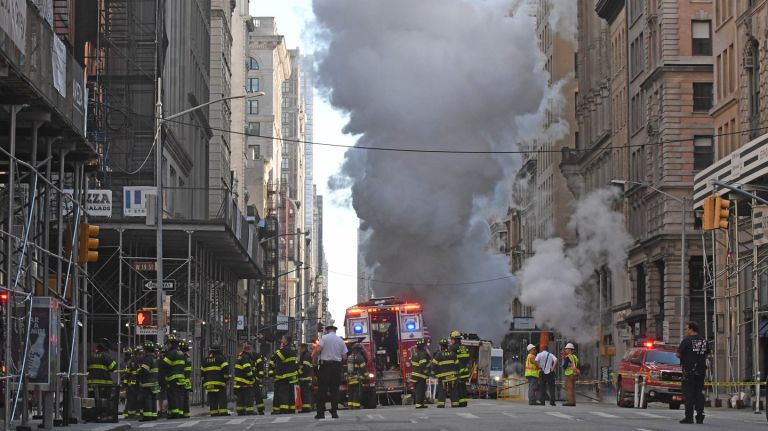 A steam pipe explosion on Fifth Avenue sent a plume of smoke in the air on  July 19.
