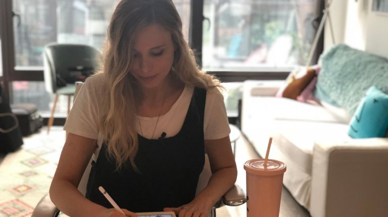 Artist Samantha Rothenberg designs a comic on an iPad in her Williamsburg apartment on July 6.