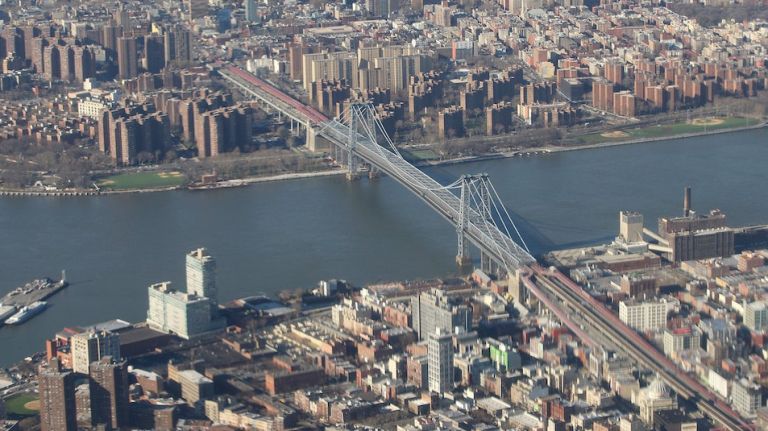 A woman jumped into the East River near the Williamsburg Bridge Thursday morning, police said. 