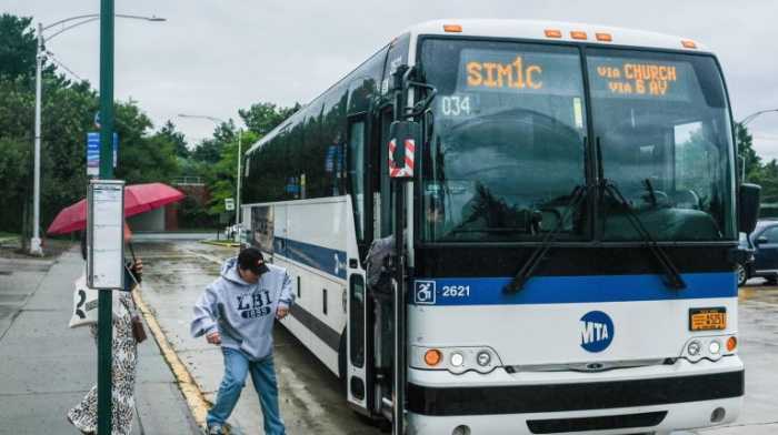 Staten Island commuter boarding express bus
