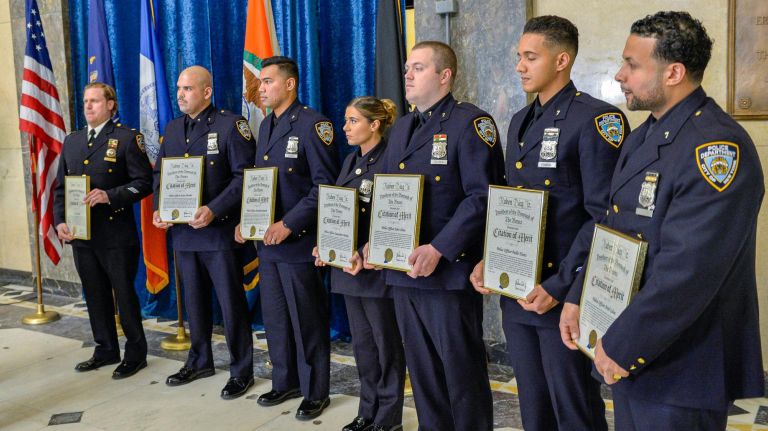 Seven NYPD officers received a Citation of Merit from Bronx Borough President Ruben Diaz Jr. on Tuesday.