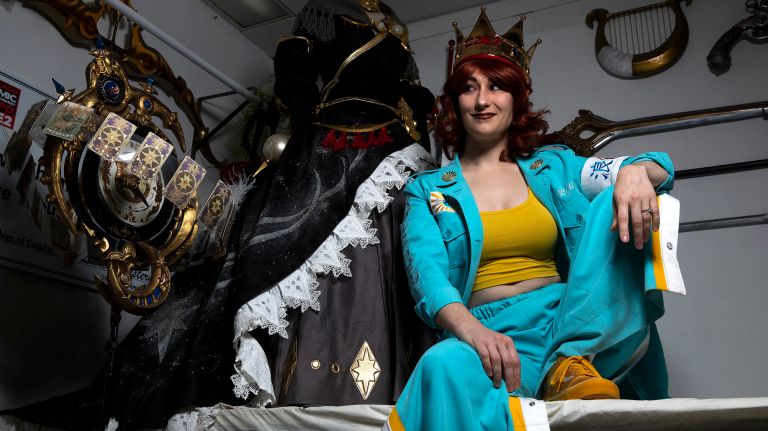 New York Comic Con cosplayer Jacqueline Collins suiting up to judge at annual event 2 Jacqueline Collins, an award-winning cosplay artist from Brooklyn, sits next to the Au Ra Astrologian costume she created. The character is from the video game "Final Fantasy XIV."
