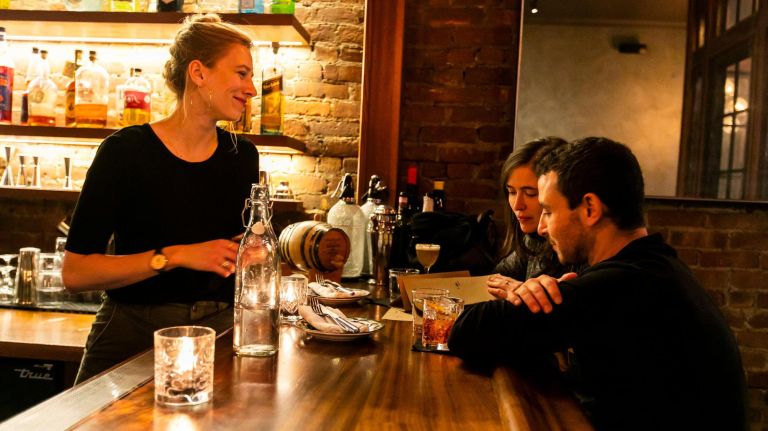 Before the L train shutdown, get to know these restaurants and bars 2 Ammazzacaffé bartender Victoria Ratermanis takes dinner orders from Brooklynites Jesse Schwartz and Yvette Grant on Nov. 13, 2018.