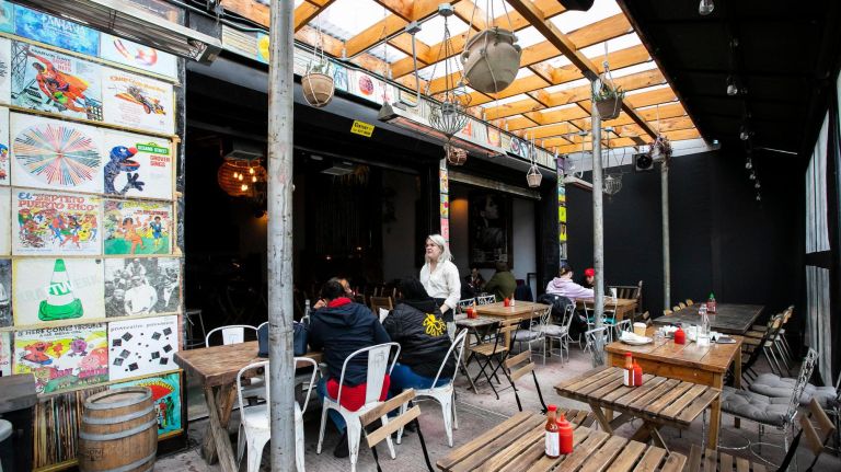 Before the L train shutdown, get to know these restaurants and bars 6 Server Cory Thompson of Brooklyn with customers in Forrest Poin's heated, enclosed patio, which is in addition to the extensive outdoor garden seating.