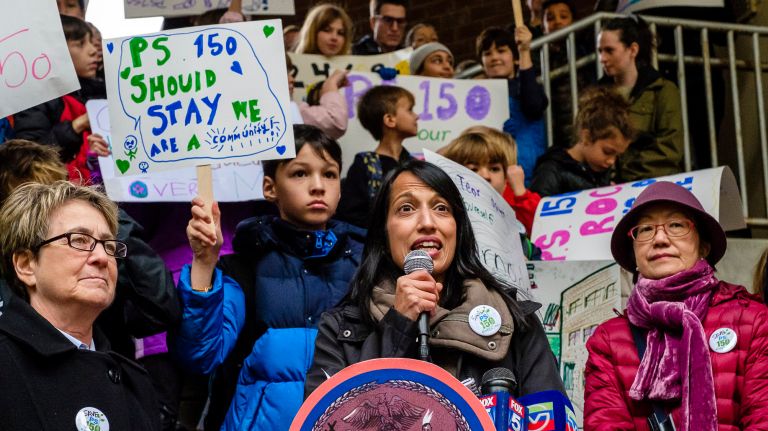 PS 150 - Tribeca Learning Center supporters, including&nbsp;PTA President Anshal Purohit, center, protest&nbsp;the closing of the Greenwich Street school on Wednesday.