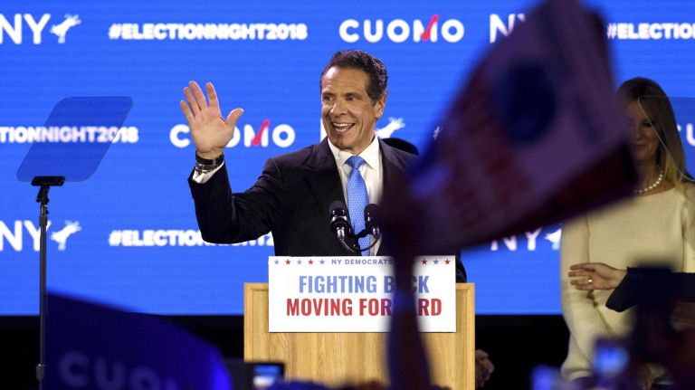 Gov. Andrew Cuomo waves to supporters in Manhattan Tuesday night after being elected to a third term.