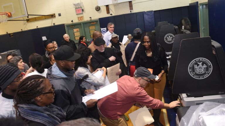 Broken scanners reported at voting sites across the city 2 Technicians work on voting machines at Public School 6 in Prospect Heights, Brooklyn where many waited as much as two hours to vote on Tuesday afternoon.