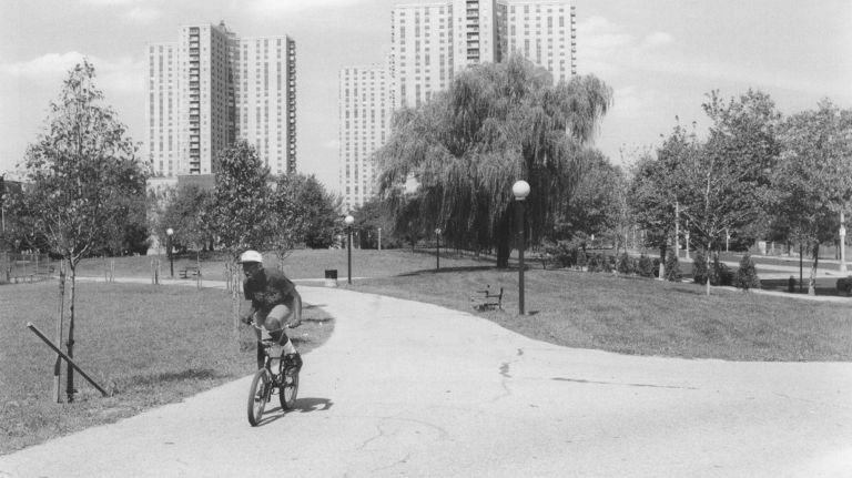 Bronx's Co-op City is celebrating 50 years as 'good affordable' housing 4 A boy rides his bicycle in Co-Op City in 1991.