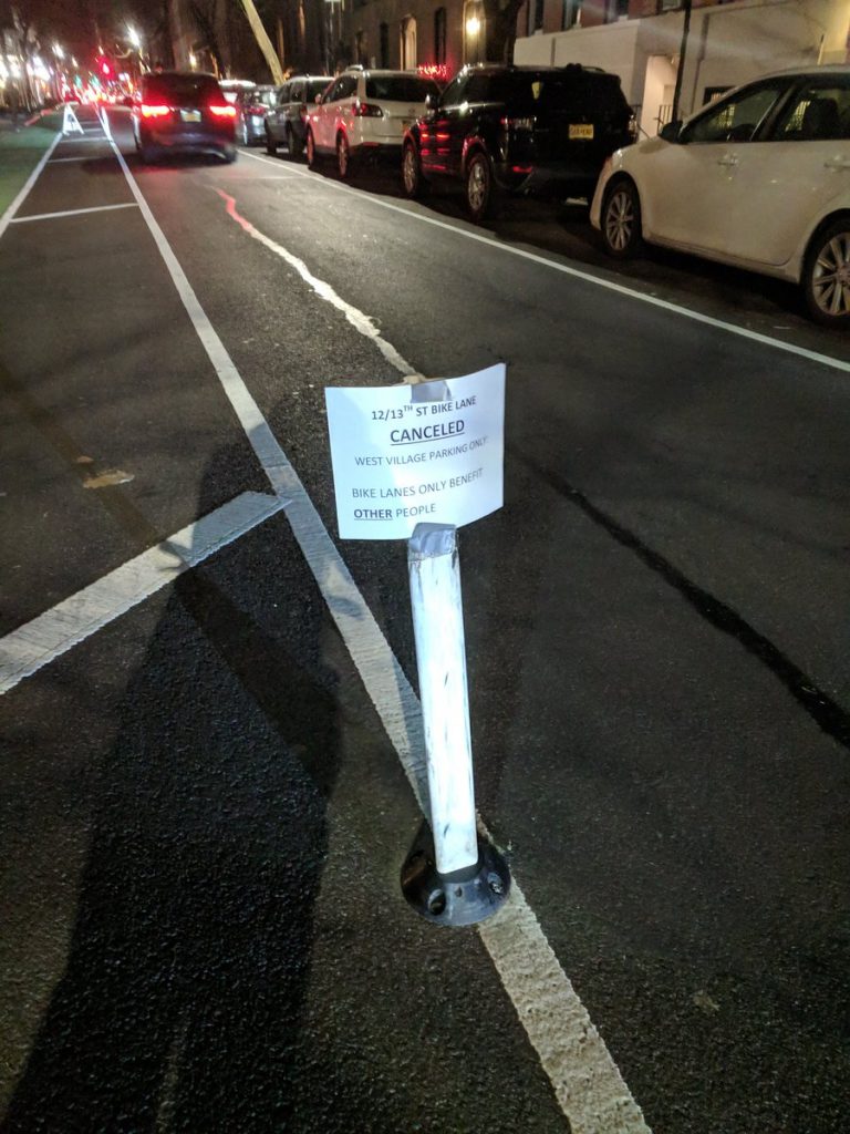 Broken glass and sharp words over L-shutdown bike lanes 4