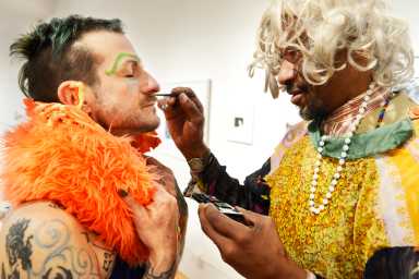 performance artist Darke Attoms (left) getting made up by Sur Rodney Sur