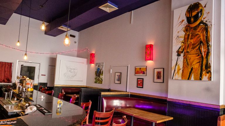 KillBar features a series of&nbsp;Tarantino-themed paintings throughout the space.