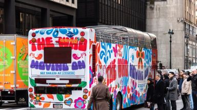 A tour bus branded for The Who's new "Moving On" tour will pick up riders in NYC through Feb. 10. 