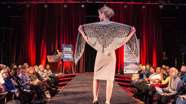 Models show off knit fashion pieces in 2016.