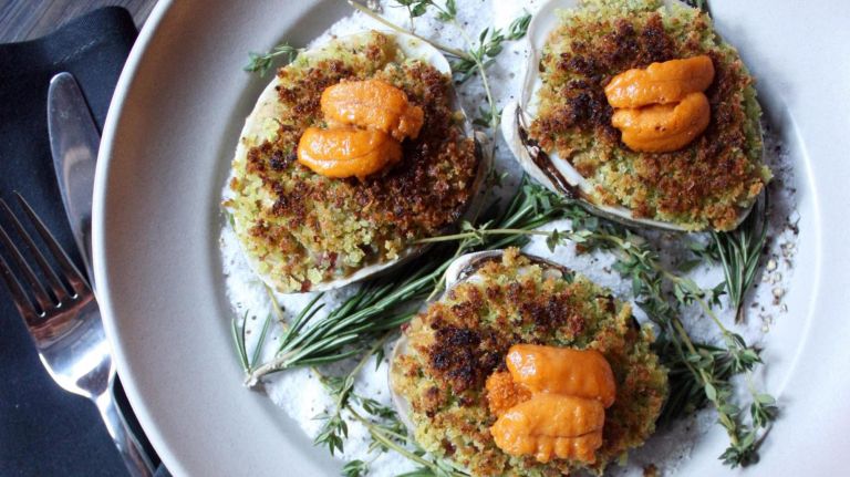 Emily team's new restaurant Violet is all about grilled pizza 3 Small plates include clam "stuffies" with linguiça, pretzel stuffing and uni.