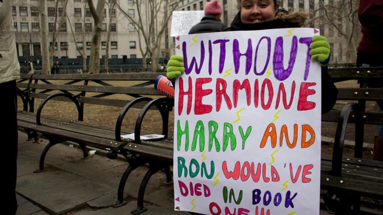 Jaryanna Rivera brought her Harry Potter-themed poster to the Women's Unity Rally in Foley Square on Saturday.