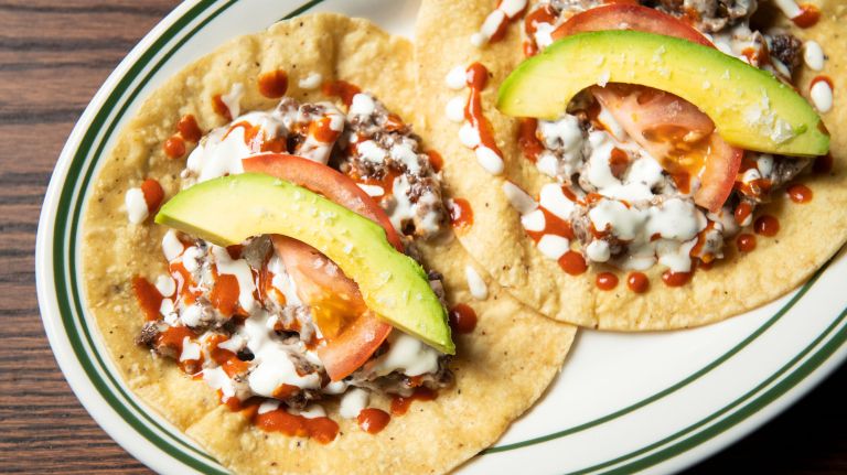 Emeril Lagasse enters NYC market with a new Greek restaurant 1 The cheeseburger tacos at the new Empellón Al Pastor in the Pod 39 hotel.