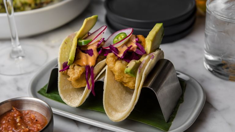 Emeril Lagasse enters NYC market with a new Greek restaurant 2 Taco options at La Central include crunchy cod.